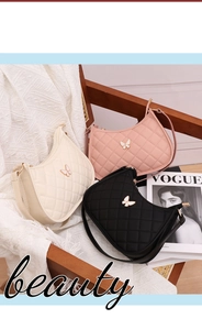 Three elegant quilted leather crescent bags in beige, pink, and black with butterfly hardware