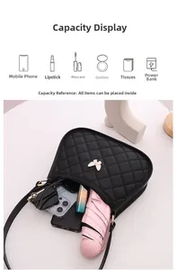 Detailed interior view of a black quilted shoulder bag showing spacious storage capacity