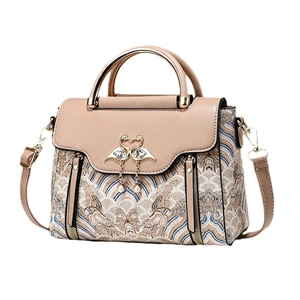 Elegant embroidered top handle bag with wave patterns and golden swan heart lock clasp