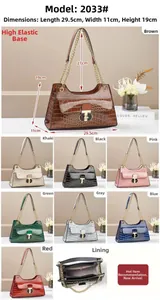 Detail view of crocodile pattern PU handbag with chain straps and internal compartments