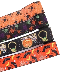 Assorted Halloween spider and pumpkin print ribbons for festive DIY party decorations