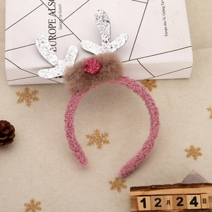 Pink plush reindeer antler headband with silver glitter and red pom-pom for Christmas