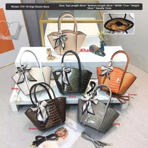 Detailed view of fashion stone pattern handbags in six colors with silk scarf accents