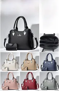 Detail view of large tote bag interior compartments and matching mini coin purse set