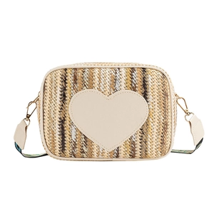 Woven straw crossbody bag with heart patch and colorful patterned wide shoulder strap