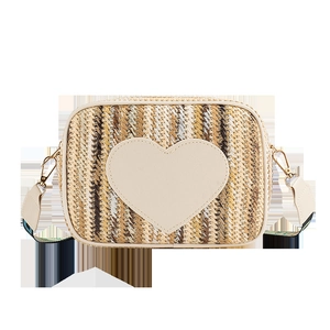 Fashionable straw crossbody bag with heart patch and wide jacquard patterned strap