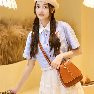 Caramel brown PU leather crossbody phone bag for women with multi-compartments and vertical zip