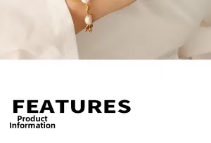 Detail of gold chain bracelet with freshwater pearls and geometric OT buckle clasp