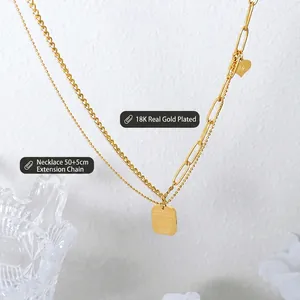 18K gold plated necklace with asymmetric double chains and heart pendant