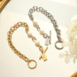 Elegant gold and silver OT buckle chain bracelet with freshwater pearls and handmade tag