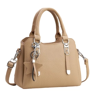Chic light brown faux leather tote bag with star charm and adjustable shoulder strap