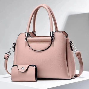 Pink lychee grain leather handbag and matching wallet set with silver hardware