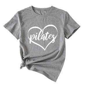 Detail of grey Pilates heart print T-shirt with stylish front knot on white background