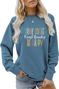 Detail of DRINK COFFEE colorful letter print on blue crewneck sweatshirt with long sleeves