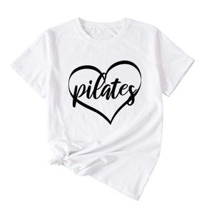 Detail of white cotton t-shirt featuring black Pilates heart print and stylish front knot