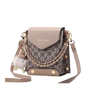 Fashionable macaron beige crossbody bag with geometric prints and gold chain handle