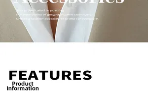 Détail d'une chemise blanche à col montant sous un blazer beige pour un look de bureau