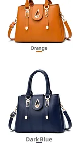 Detailed comparison of orange and dark blue handbags with litchi texture and metal locks