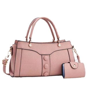 Pink lychee texture handbag set with pearl buckle detail and matching wallet