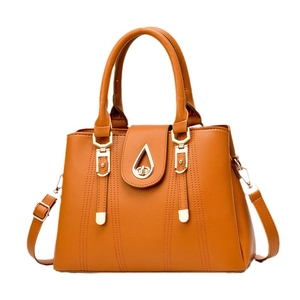 Stylish brown faux leather tote bag with gold metal lock and adjustable shoulder strap