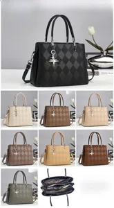 Close-up of quilted handbag texture with star pendant and detailed interior compartments