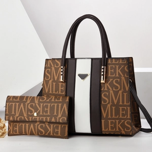 Tote bag with matching wallet set in cream and brown featuring a classic letter print