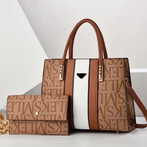 Brown and white geometric tote bag with letter print and matching wallet set