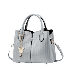 Silver grey litchi grain shoulder bag with vertical stitching and bunny charm
