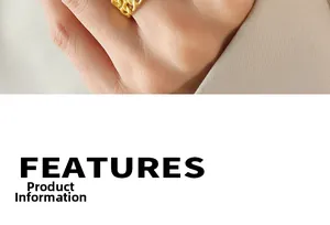 Detail view of a double-layered gold chain ring shown on a finger with minimalist style