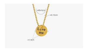 Detail view of 18K gold plated ball chain necklace with engraved Love me round pendant