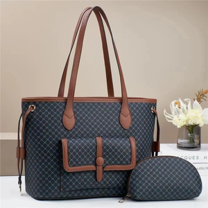 Blue geometric pattern tote bag set with brown leather trim and matching pouch