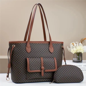 Three-piece tote bag set with geometric patterns and brown leather accents