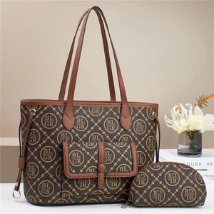 Detailed view of 3-piece brown logo print tote bag set including a clutch and cosmetic bag