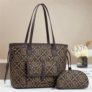 Brown monogram 3-piece bag set with tote, crossbody, and pouch for stylish women