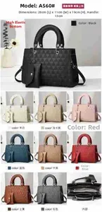Quilted handbag set with round handles and dimensions of 28x11x19 cm in nine colors