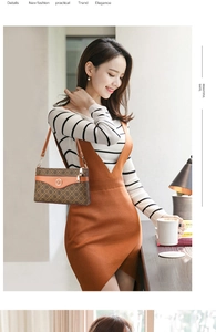 Detail of a brown vintage tote bag with orange leather flap and circular metal K buckle