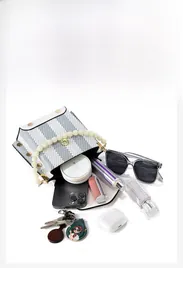 Top view of contrast color crossbody bag showing large capacity for essentials