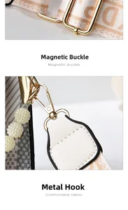 Detail of adjustable metal buckle and woven strap with jacquard pattern on shoulder bag