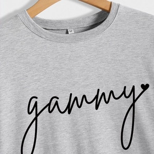 Women's casual grey crewneck sweatshirt with gammy text and heart graphic print