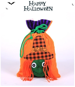 Detailed view of velvet Halloween drawstring bag featuring a green-faced witch design