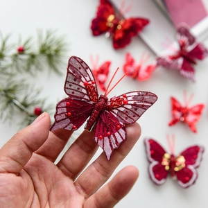 Red glitter hollow butterfly ornaments for Christmas tree decor with clip attachments