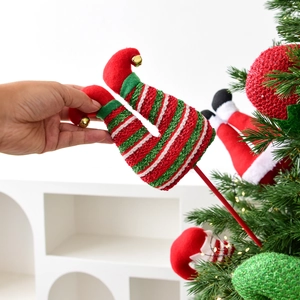 Christmas elf leg stakes with red and green sequins and bells for tree decoration