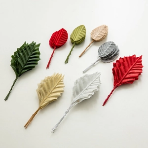 Handmade artificial Christmas leaves with wire stems in various festive colors