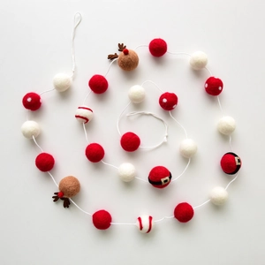 Handmade Christmas felt ball garland with reindeer and Santa designs for holiday decor