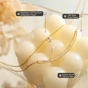 Double-layered 18K gold-plated titanium necklace with micro-pave zircon smile bar