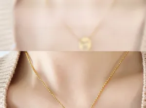 Minimalist gold bead chain necklace worn on model for everyday fashion jewelry styling