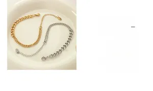 Detail of handcrafted mixed cuban and bead chain bracelet with lobster clasp and extension