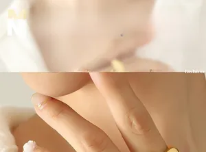 Detail showing the intricate floral design on a gold-plated vintage irregular open ring