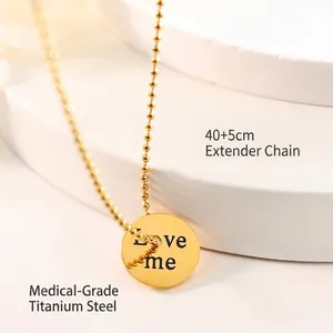 18K gold plated titanium steel necklace with Love me engraved round coin pendant