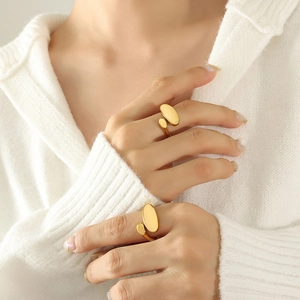 Minimalist 18k gold plated stainless steel open bean ring set with a polished mirror finish